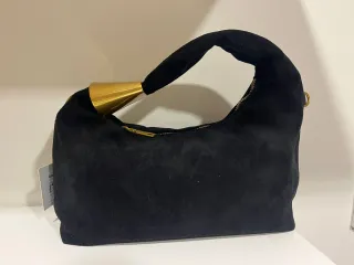 Bolsos de piel y de más tipos