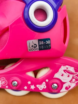 Patines rosas y morados talla 28-30 + protecciones