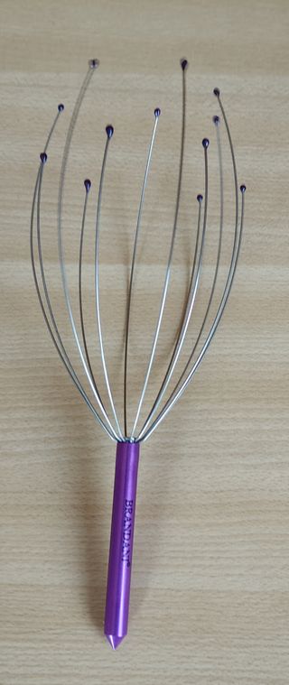 Massaggiatore per testa , scaccia pensieri