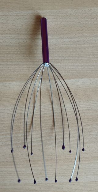 Massaggiatore per testa , scaccia pensieri