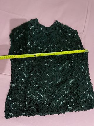 Top nero con paillettes