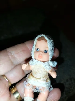 Mini bambole per case delle bambole