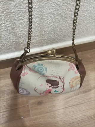 Bolso de mano con cierre de boquilla