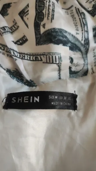 Piumino corto stampa banconote