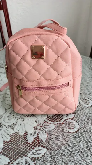 Mochila rosa acolchada niña