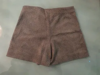 Gonna pantaloni a quadri con fiocco e ricamo