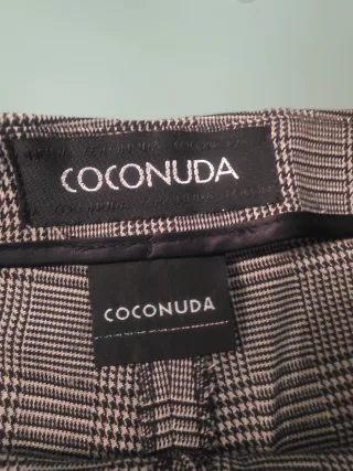 Gonna pantaloni a quadri con fiocco e ricamo