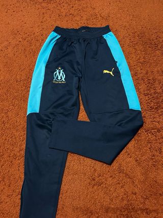 Pantalones deportivos azules con cremallera