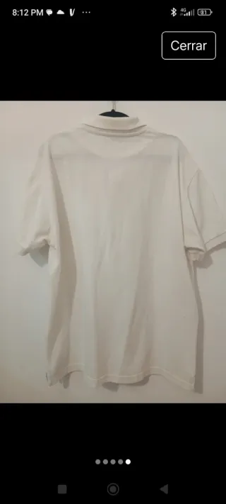 Polo blanco de hombro