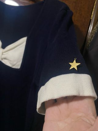 Vestido vintage azul con lazo blanco y estrellas