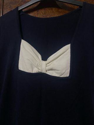 Vestido vintage azul con lazo blanco y estrellas