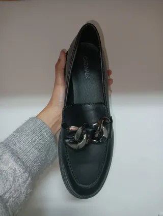 Mocasines negros Catwalk con cadena