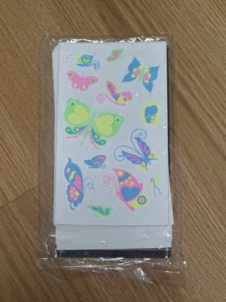 32 hojas de tatuajes temporales luminosos