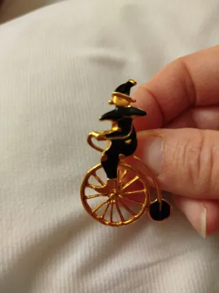 Spilla vintage clown su monociclo