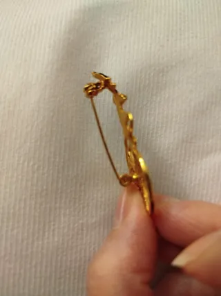 Spilla vintage clown su monociclo