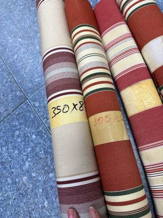 Rollos de tela gruesa con rayas