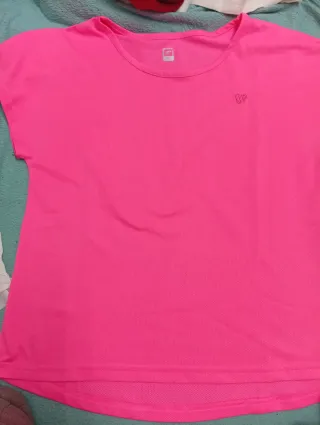 Camiseta deportiva rosa transpirable Up y polo bla