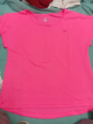 Camiseta deportiva rosa transpirable Up y polo bla