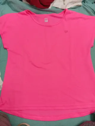 Camiseta deportiva rosa transpirable Up y polo bla