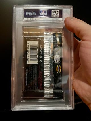 Bustina Pokémon Team Rocket 1st Ed PSA 9