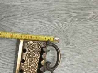 Ferro da stiro antico in ottone