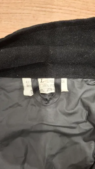 Chaqueta chubasquero DG negra