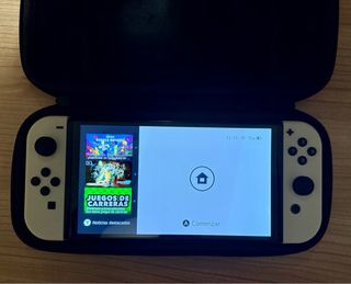 Nintendo Switch OLED Bianca con accessori