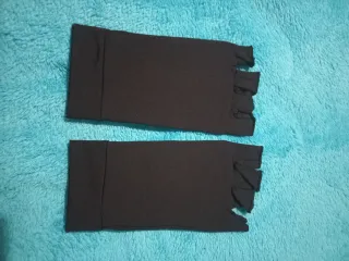 Guantes sin dedos negros