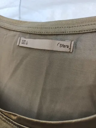 Camiseta dorada brillante sin mangas