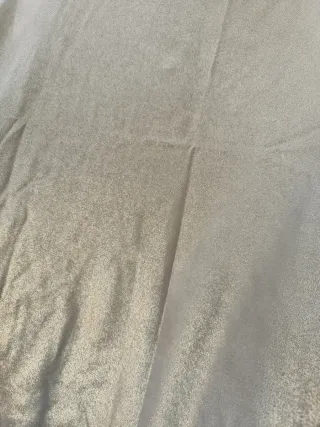 Camiseta dorada brillante sin mangas