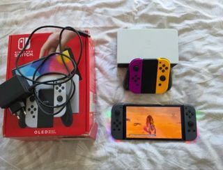 Nintendo Switch OLED Viola/Bianco/Giallo