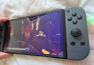 Nintendo Switch OLED Viola/Bianco/Giallo