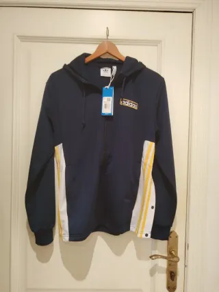 Chaqueta Adidas azul y amarilla