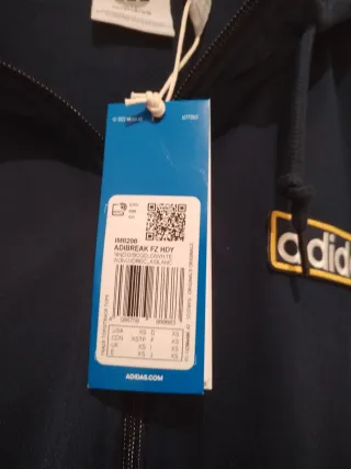 Chaqueta Adidas azul y amarilla