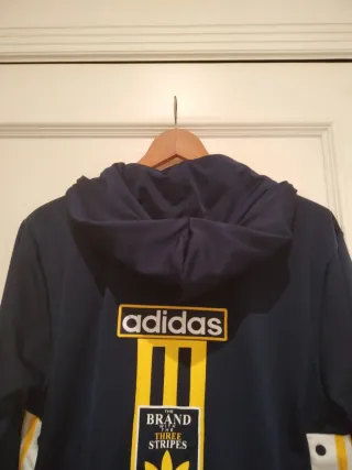 Chaqueta Adidas azul y amarilla