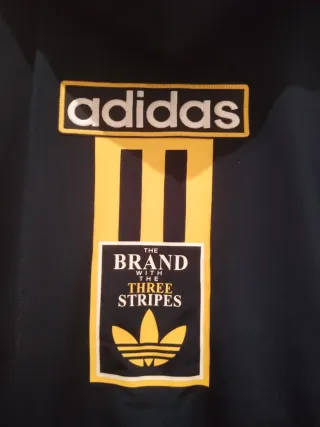 Chaqueta Adidas azul y amarilla