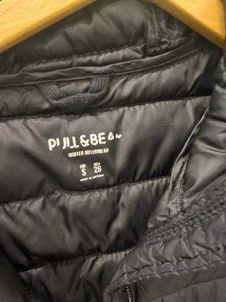 Plumas negro con capucha