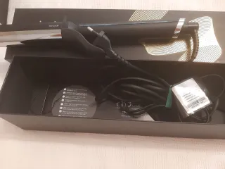 Rizador de pelo ghd negro y plateado