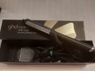 Rizador de pelo ghd negro y plateado
