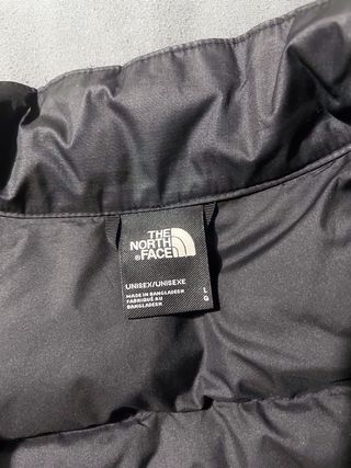 Chaqueta The North Face Plumas Marrón y Negra.