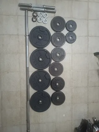 Barra de pesas con discos y seguros
