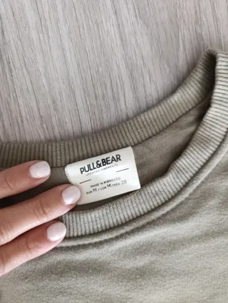 Conjunto sudadera y falda verde oliva