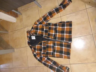 Chaqueta Zara cuadros naranja y negro