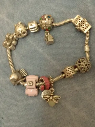 Pulsera Pandora Plata con Charms,casi compla.plata