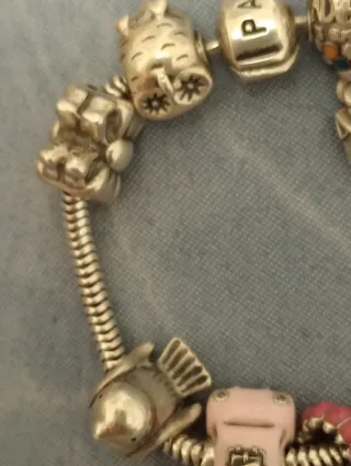 Pulsera Pandora Plata con Charms,casi compla.plata