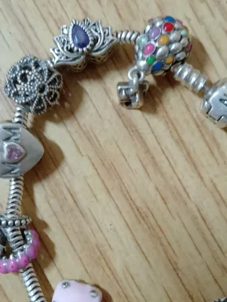 Pulsera Pandora Plata con Charms,casi compla.plata