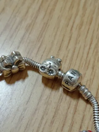 Pulsera Pandora Plata con Charms,casi compla.plata
