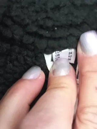 Pellicciotto bicolore nero e bianco