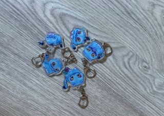 Bolso Huntrix Morado y Blanco