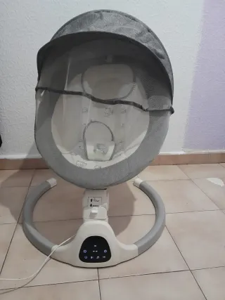 Culla per neonati con funzione relax elettrica